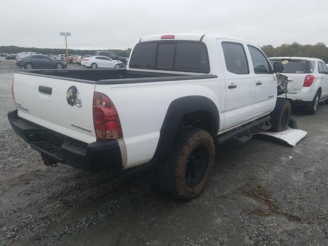 Photo 3 VIN: 5TFJX4GN0EX031059 - TOYOTA TACOMA DOU 