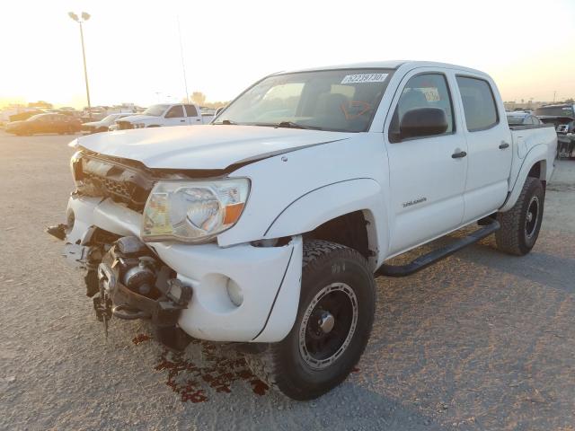 Photo 1 VIN: 5TFLU4EN6BX013780 - TOYOTA TACOMA DOU 