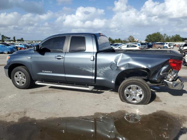 Photo 1 VIN: 5TFRM5F10AX006575 - TOYOTA TUNDRA DOU 