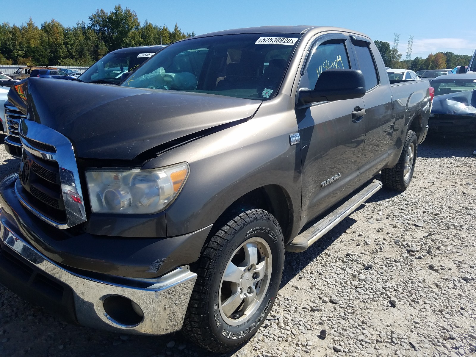 Photo 1 VIN: 5TFRM5F10AX006799 - TOYOTA TUNDRA DOU 