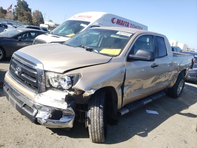 Photo 1 VIN: 5TFRM5F11AX002633 - TOYOTA TUNDRA DOU 