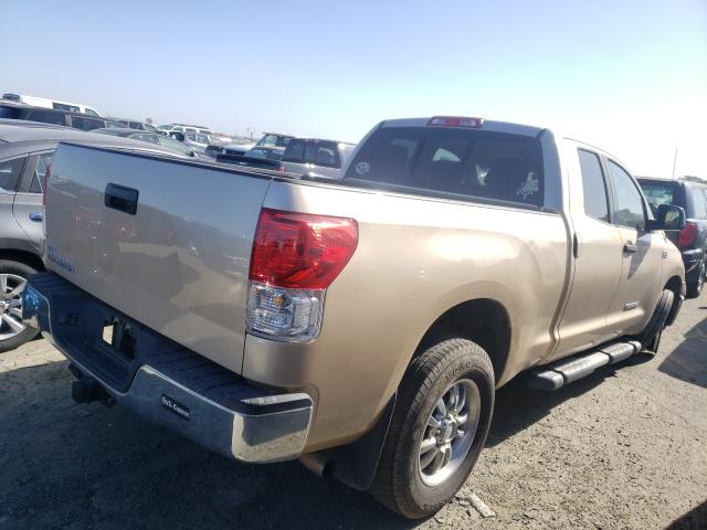 Photo 3 VIN: 5TFRM5F11AX002633 - TOYOTA TUNDRA DOU 