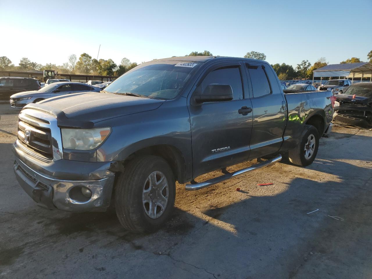 Photo 0 VIN: 5TFRM5F11AX011039 - TOYOTA TUNDRA 