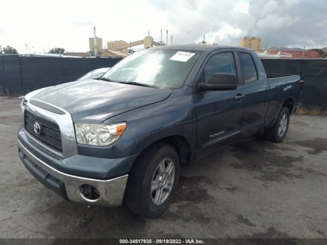 Photo 1 VIN: 5TFRM5F11AX015575 - TOYOTA TUNDRA 2WD TRUCK 