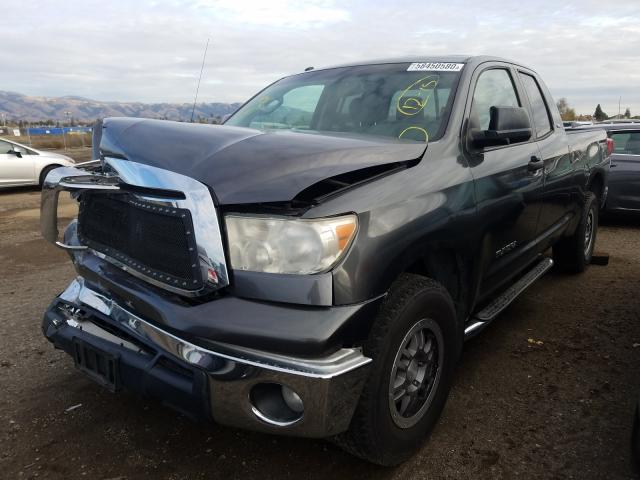 Photo 1 VIN: 5TFRM5F11DX057040 - TOYOTA TUNDRA DOU 