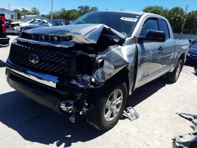 Photo 1 VIN: 5TFRM5F11KX142361 - TOYOTA TUNDRA DOU 