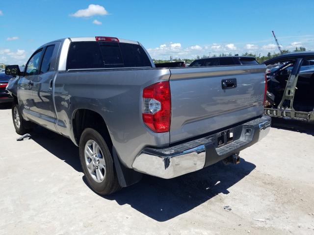 Photo 2 VIN: 5TFRM5F11KX142361 - TOYOTA TUNDRA DOU 