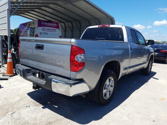 Photo 3 VIN: 5TFRM5F11KX142361 - TOYOTA TUNDRA DOU 