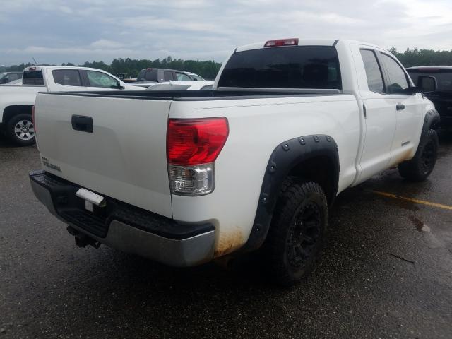 Photo 3 VIN: 5TFRM5F12AX017402 - TOYOTA TUNDRA 