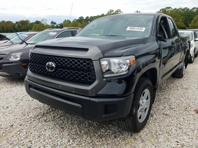 Photo 1 VIN: 5TFRM5F15KX142850 - TOYOTA TUNDRA DOU 