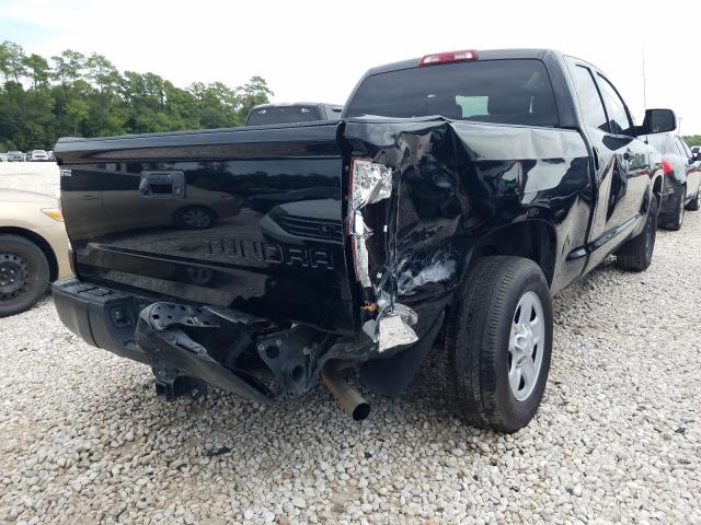 Photo 3 VIN: 5TFRM5F15KX142850 - TOYOTA TUNDRA DOU 