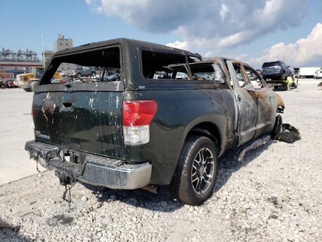 Photo 3 VIN: 5TFRM5F19AX003951 - TOYOTA TUNDRA DOU 