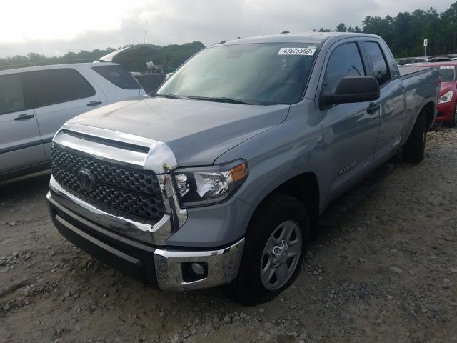 Photo 1 VIN: 5TFRM5F19KX139594 - TOYOTA TUNDRA DOU 