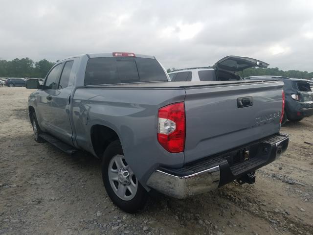 Photo 2 VIN: 5TFRM5F19KX139594 - TOYOTA TUNDRA DOU 