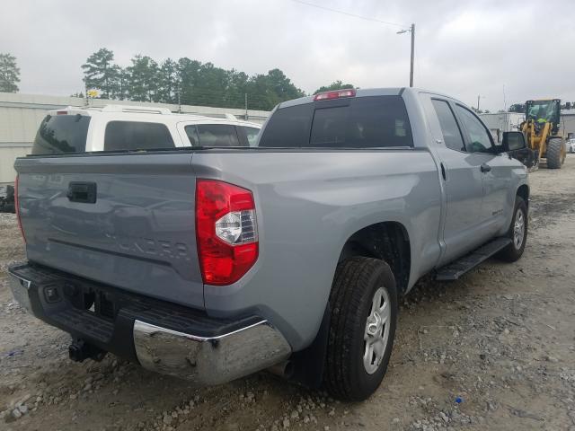 Photo 3 VIN: 5TFRM5F19KX139594 - TOYOTA TUNDRA DOU 