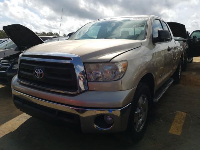 Photo 1 VIN: 5TFRM5F1XAX017955 - TOYOTA TUNDRA DOU 