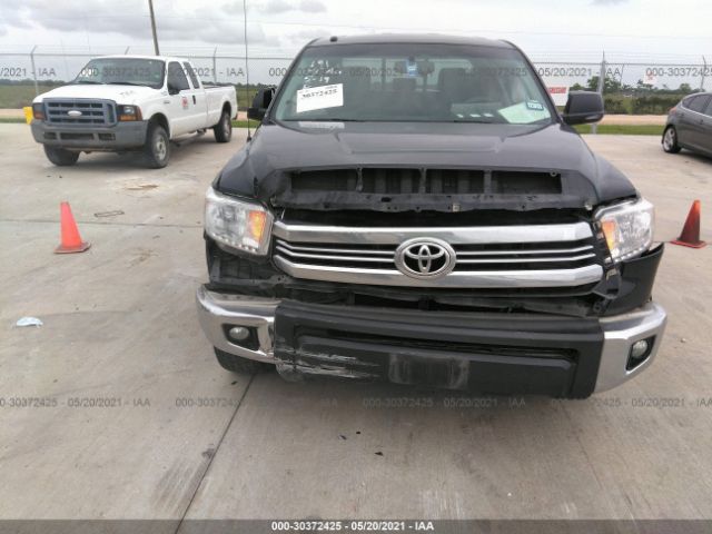 Photo 5 VIN: 5TFRM5F1XGX099310 - TOYOTA TUNDRA 2WD TRUCK 