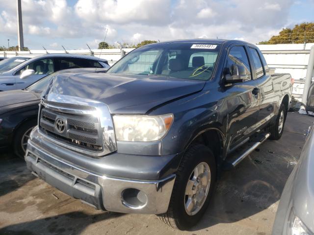 Photo 1 VIN: 5TFRU5F10AX023120 - TOYOTA TUNDRA DOU 