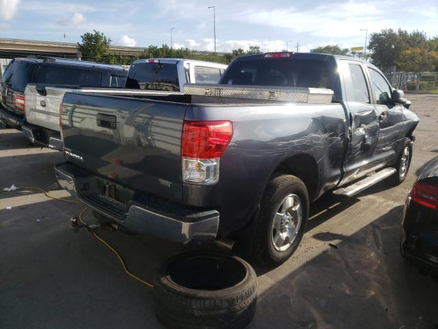 Photo 3 VIN: 5TFRU5F10AX023120 - TOYOTA TUNDRA DOU 