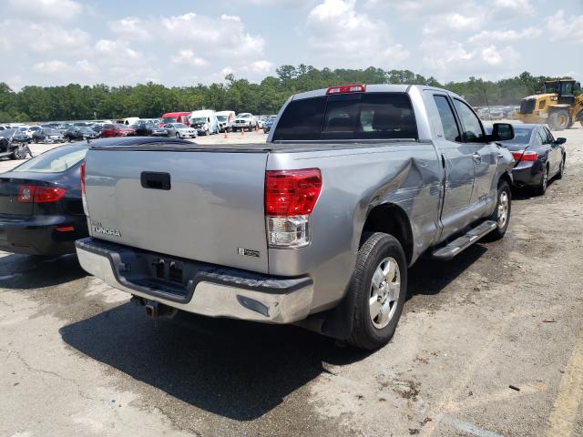 Photo 3 VIN: 5TFRY5F11AX096615 - TOYOTA TUNDRA DOU 