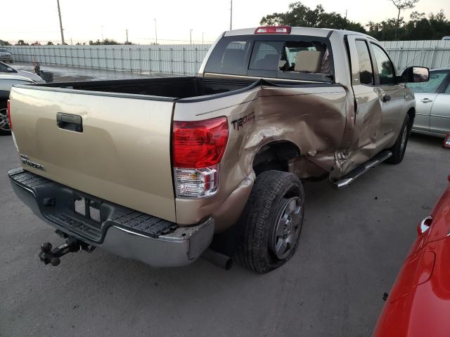 Photo 3 VIN: 5TFRY5F15AX087609 - TOYOTA TUNDRA DOU 