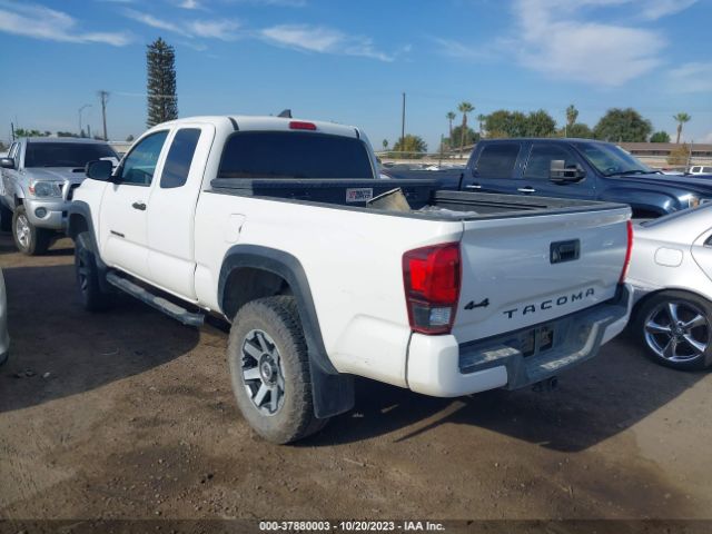 Photo 2 VIN: 5TFSX5EN2KX069661 - TOYOTA TACOMA 4WD 