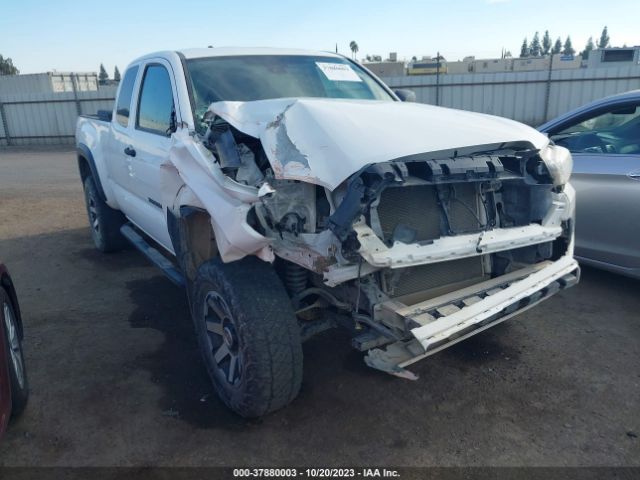 Photo 5 VIN: 5TFSX5EN2KX069661 - TOYOTA TACOMA 4WD 