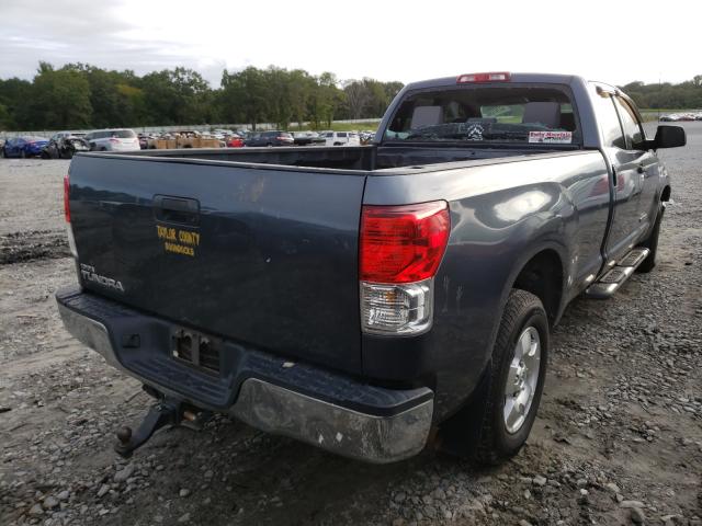 Photo 3 VIN: 5TFTM5F12AX001139 - TOYOTA TUNDRA DOU 