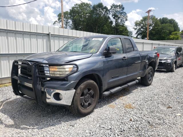 Photo 1 VIN: 5TFUM5F11AX010547 - TOYOTA TUNDRA DOU 