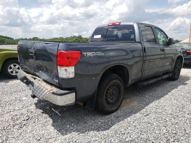 Photo 3 VIN: 5TFUM5F11AX010547 - TOYOTA TUNDRA DOU 