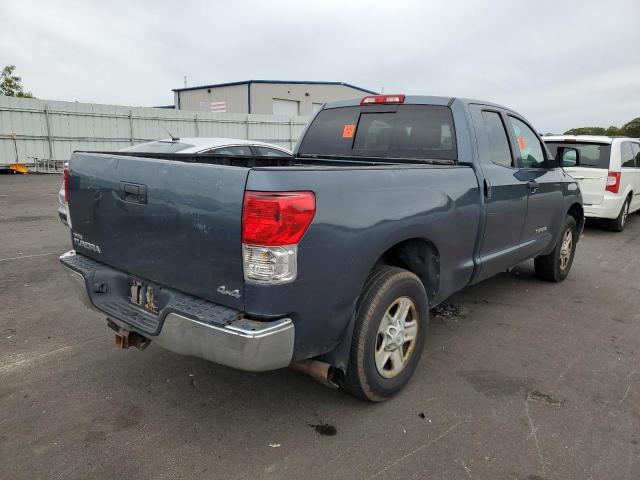 Photo 3 VIN: 5TFUM5F11AX015585 - TOYOTA TUNDRA DOU 