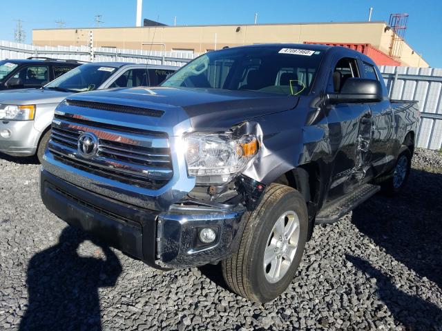 Photo 1 VIN: 5TFUM5F12HX070265 - TOYOTA TUNDRA DOU 