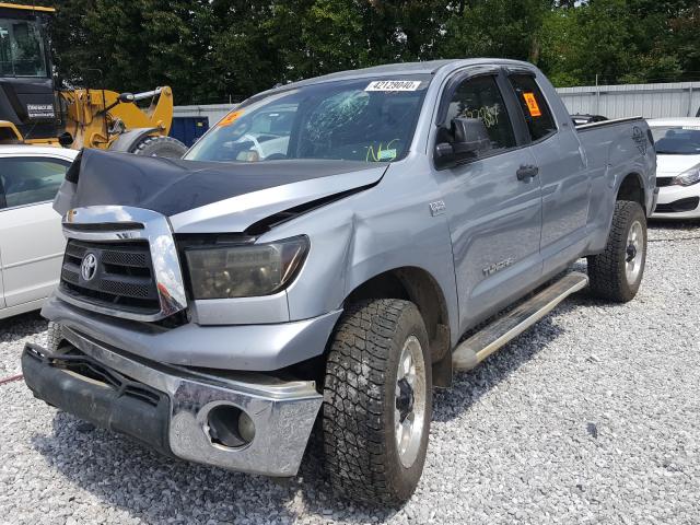 Photo 1 VIN: 5TFUM5F13AX004524 - TOYOTA TUNDRA DOU 