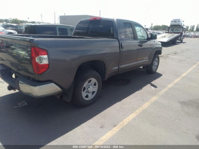 Photo 3 VIN: 5TFUM5F13EX052837 - TOYOTA TUNDRA 4WD TRUCK 