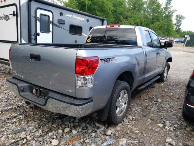 Photo 3 VIN: 5TFUM5F15AX010874 - TOYOTA TUNDRA DOU 