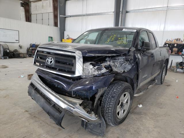 Photo 8 VIN: 5TFUM5F15CX028536 - TOYOTA TUNDRA DOU 