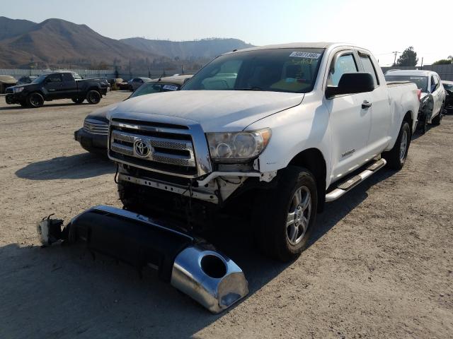 Photo 1 VIN: 5TFUM5F17AX015025 - TOYOTA TUNDRA DOU 