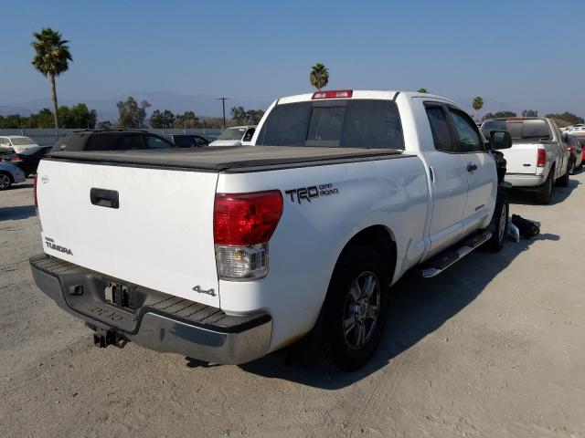 Photo 3 VIN: 5TFUM5F17AX015025 - TOYOTA TUNDRA DOU 