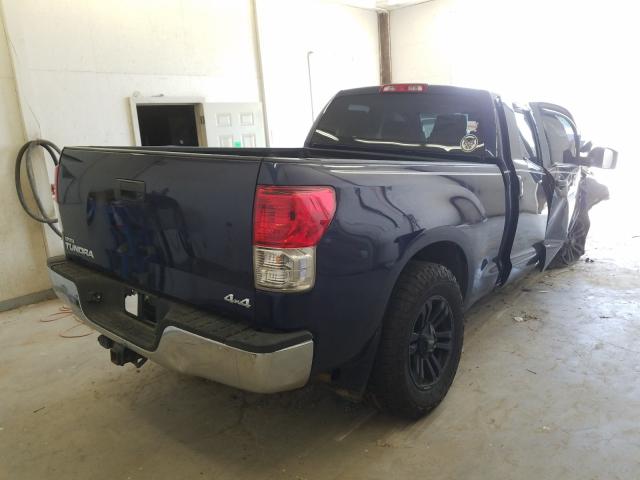 Photo 3 VIN: 5TFUM5F19CX032766 - TOYOTA TUNDRA DOU 