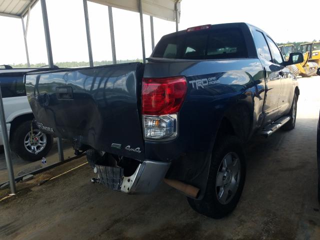 Photo 3 VIN: 5TFUW5F16AX097131 - TOYOTA TUNDRA DOU 