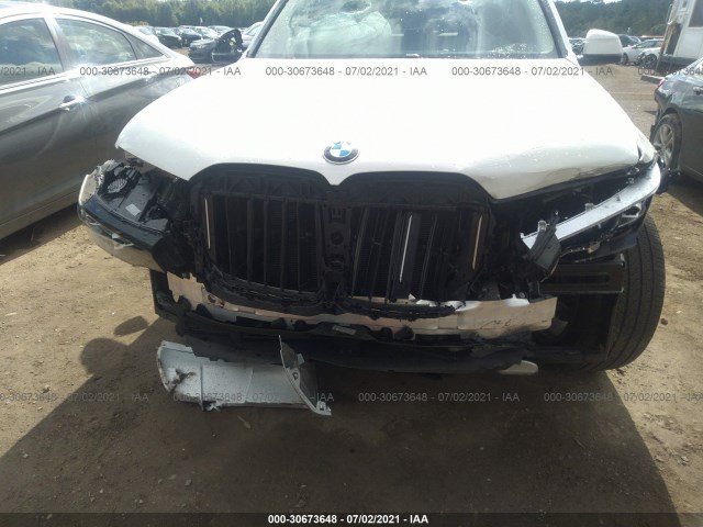 Photo 5 VIN: 5UXCW2C00L9B88877 - BMW X7 