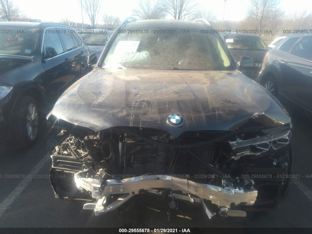 Photo 5 VIN: 5UXCX4C58KLS38976 - BMW X7 