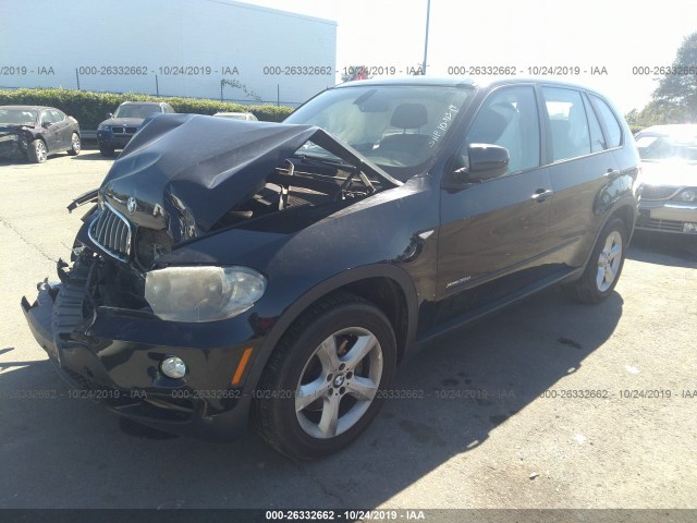 Photo 1 VIN: 5UXFF0C5XALT84769 - BMW X5 