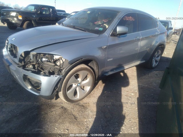 Photo 1 VIN: 5UXFH0C58ALC66202 - BMW X6 