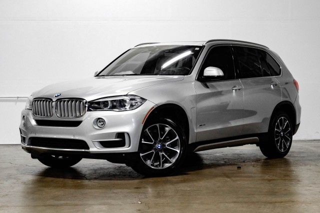 Photo 1 VIN: 5UXKR0C58J0X85289 - BMW X5 