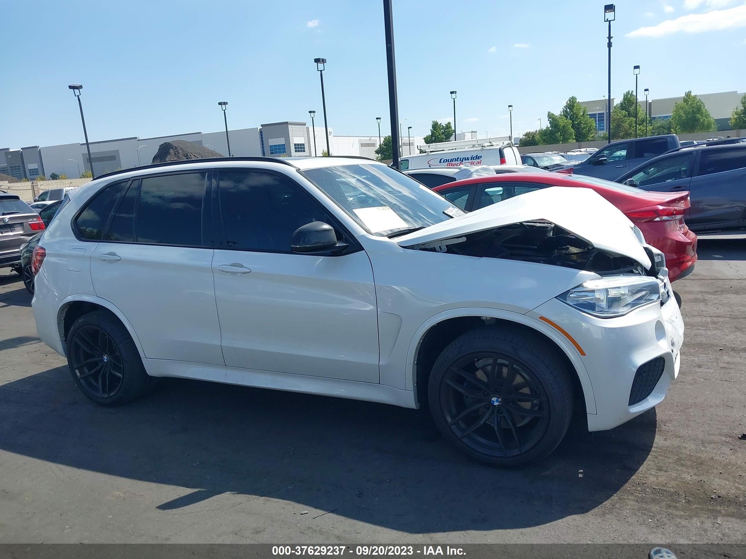 Photo 12 VIN: 5UXKR2C33H0X04025 - BMW X5 