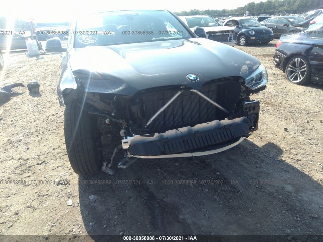 Photo 5 VIN: 5UXUJ3C55KLG56379 - BMW X4 