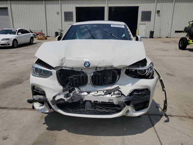 Photo 4 VIN: 5UXUJ3C58KLA58643 - BMW X4 