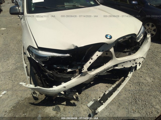 Photo 5 VIN: 5UXUJ5C55KLA93362 - BMW X4 