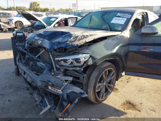 Photo 5 VIN: 5UXUJ5C5XKLJ63063 - BMW X4 